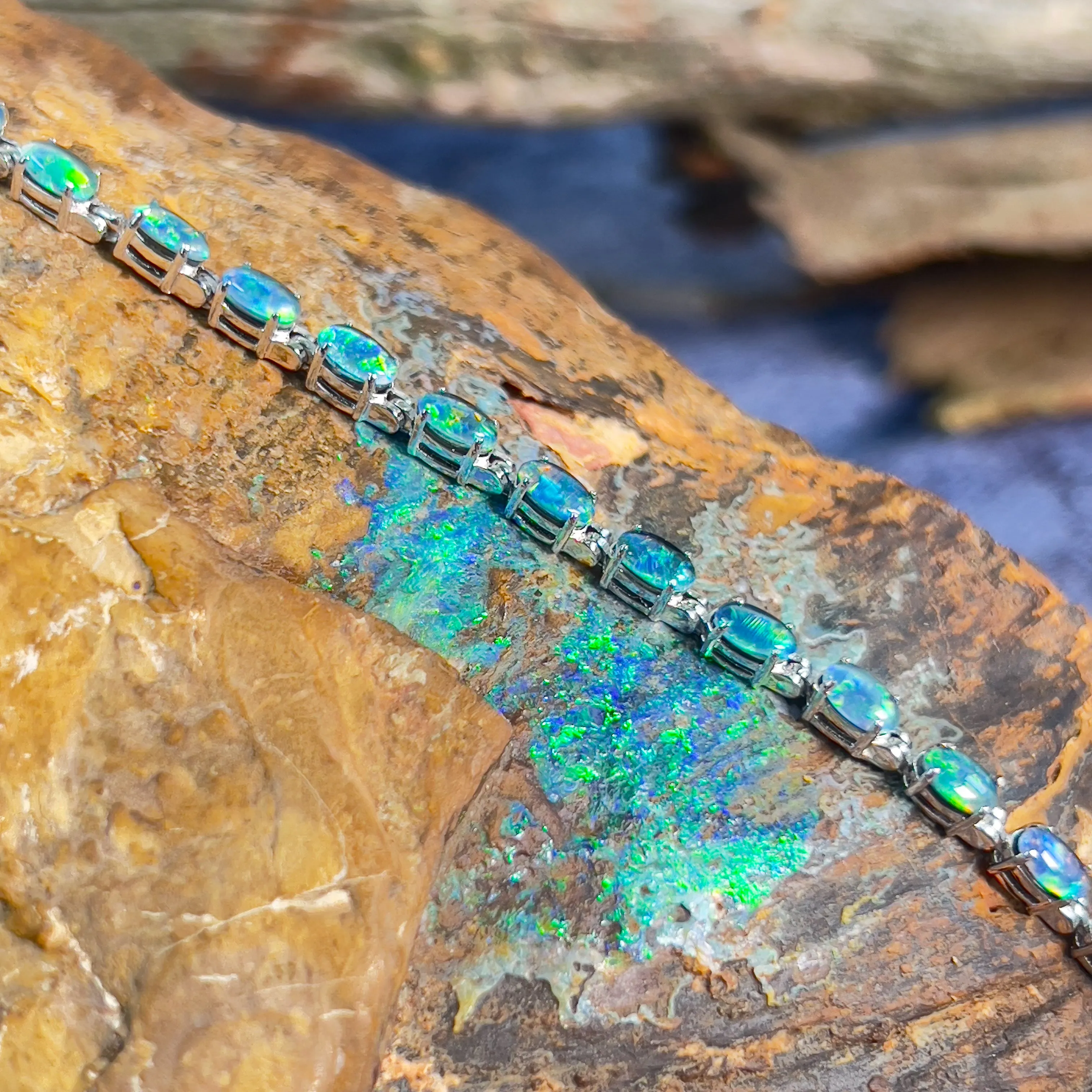 Sterling Silver Opal 5x3mm triplet tennis bracelet claw