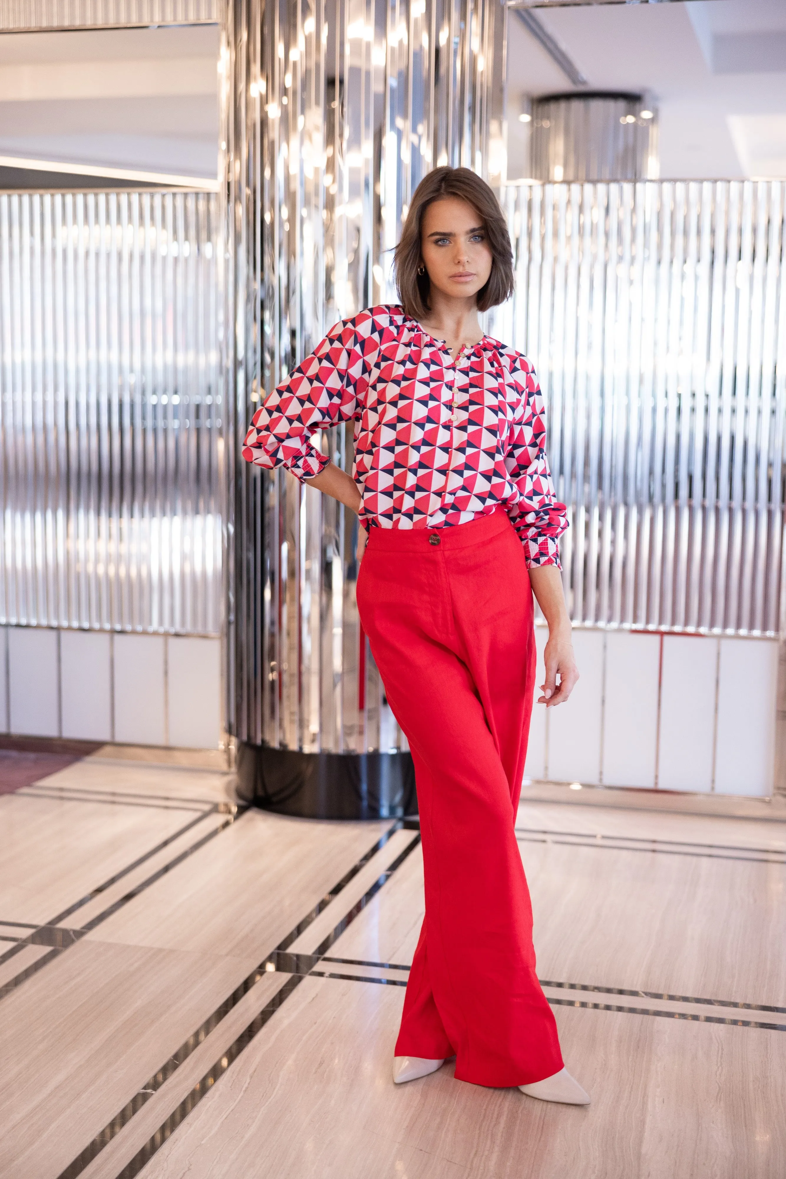 Two T's Triangle Print Top