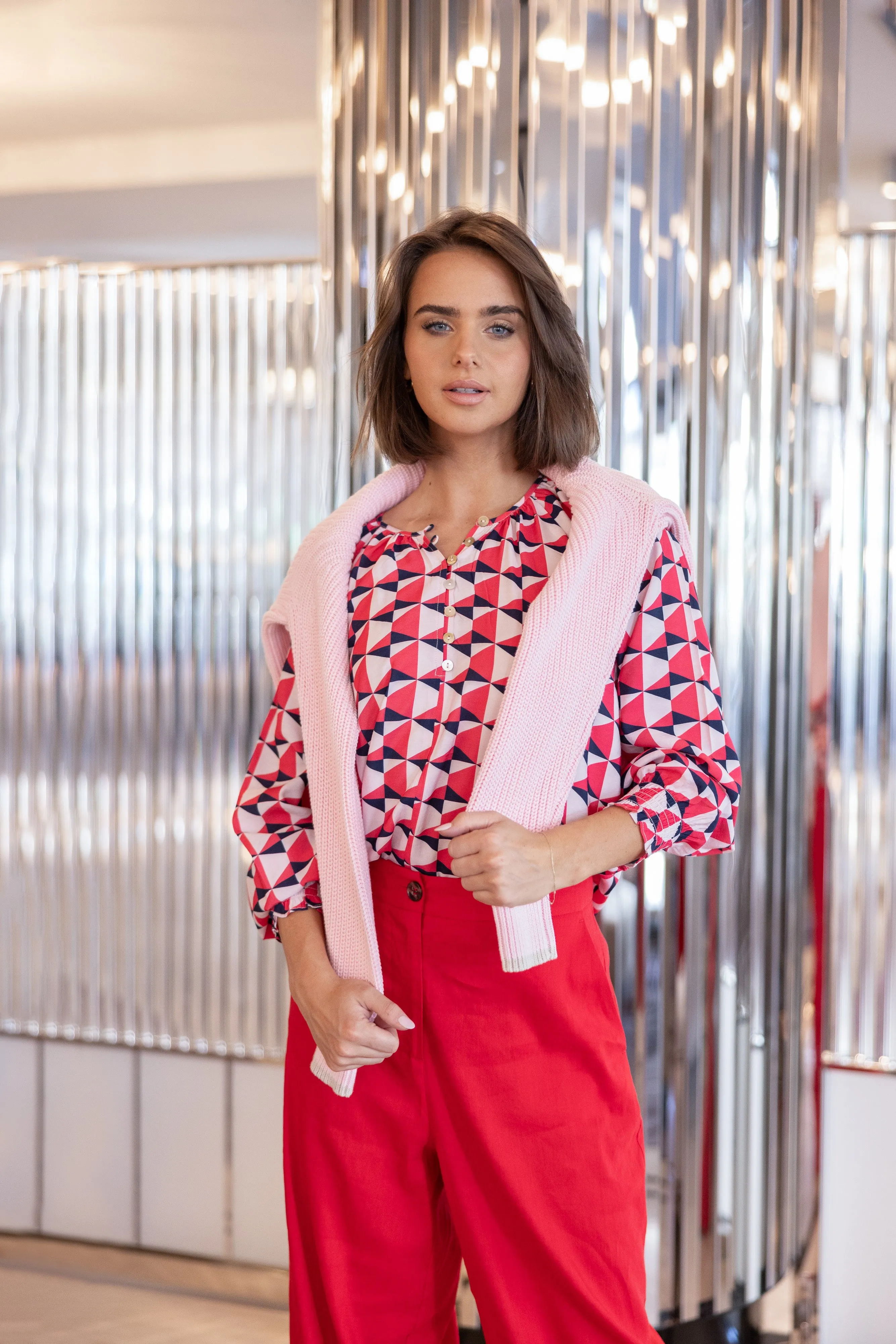 Two T's Triangle Print Top