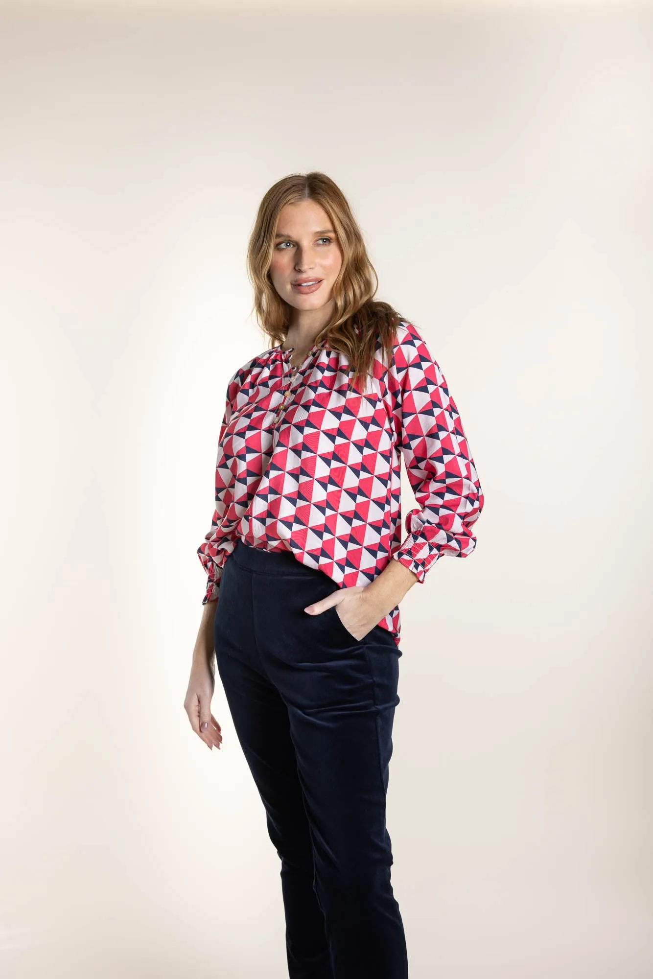 Two T's Triangle Print Top